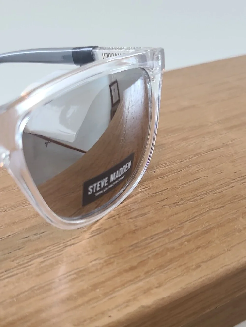 Steve Madden Clear Frame Sunglasses with Reflective Lenses